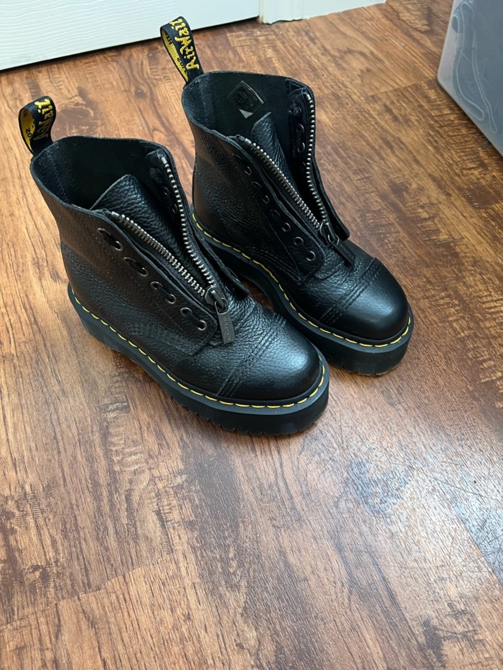Dr. Martens Black Leather Platform Ankle Boots with Yellow Stitching